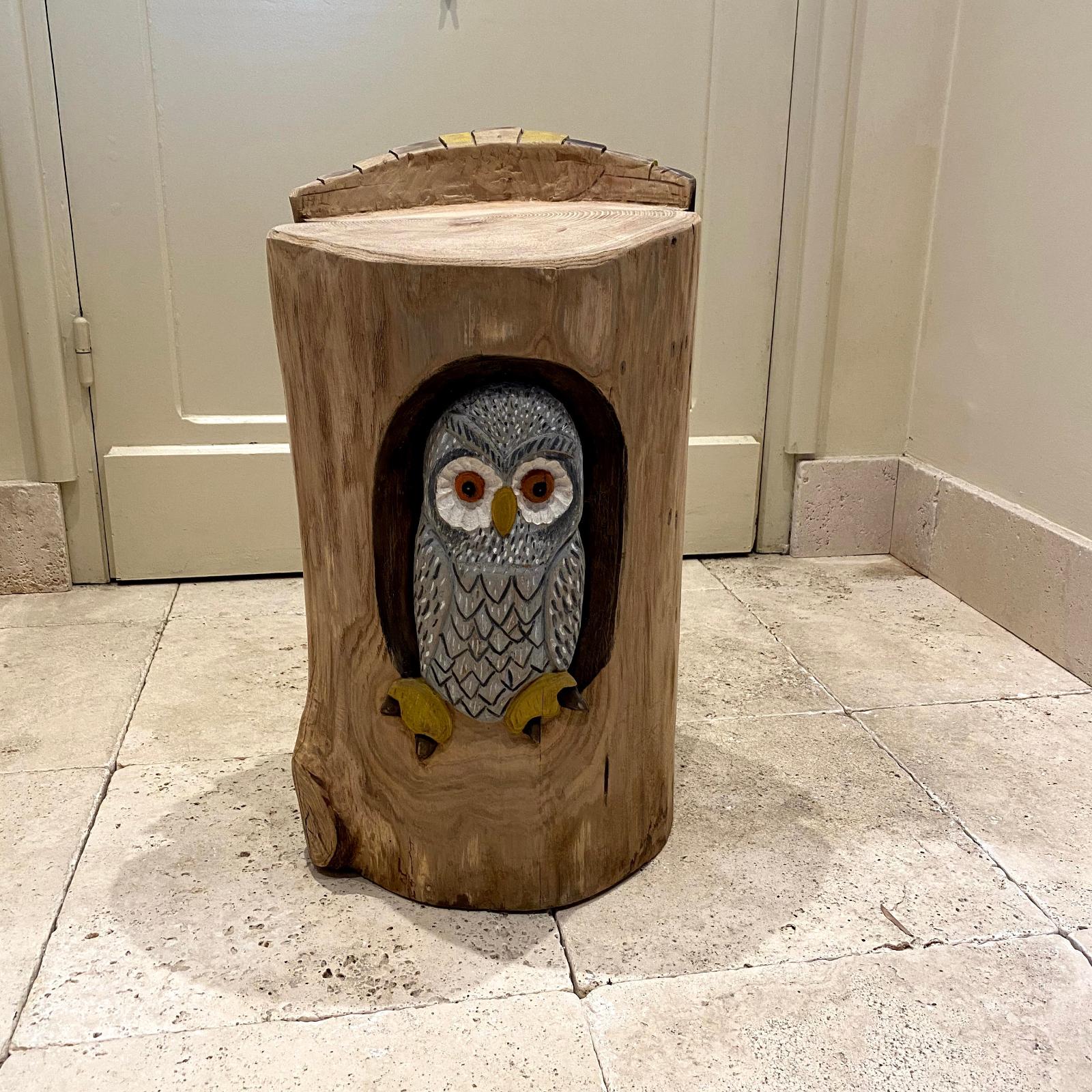 Asiento de madera tronco tallado